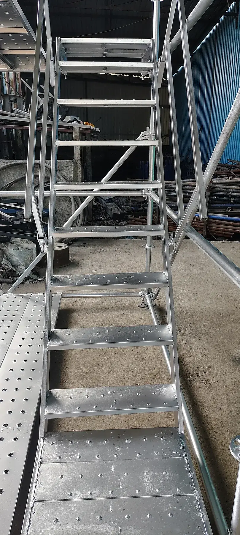 Engineered metal staircase access system