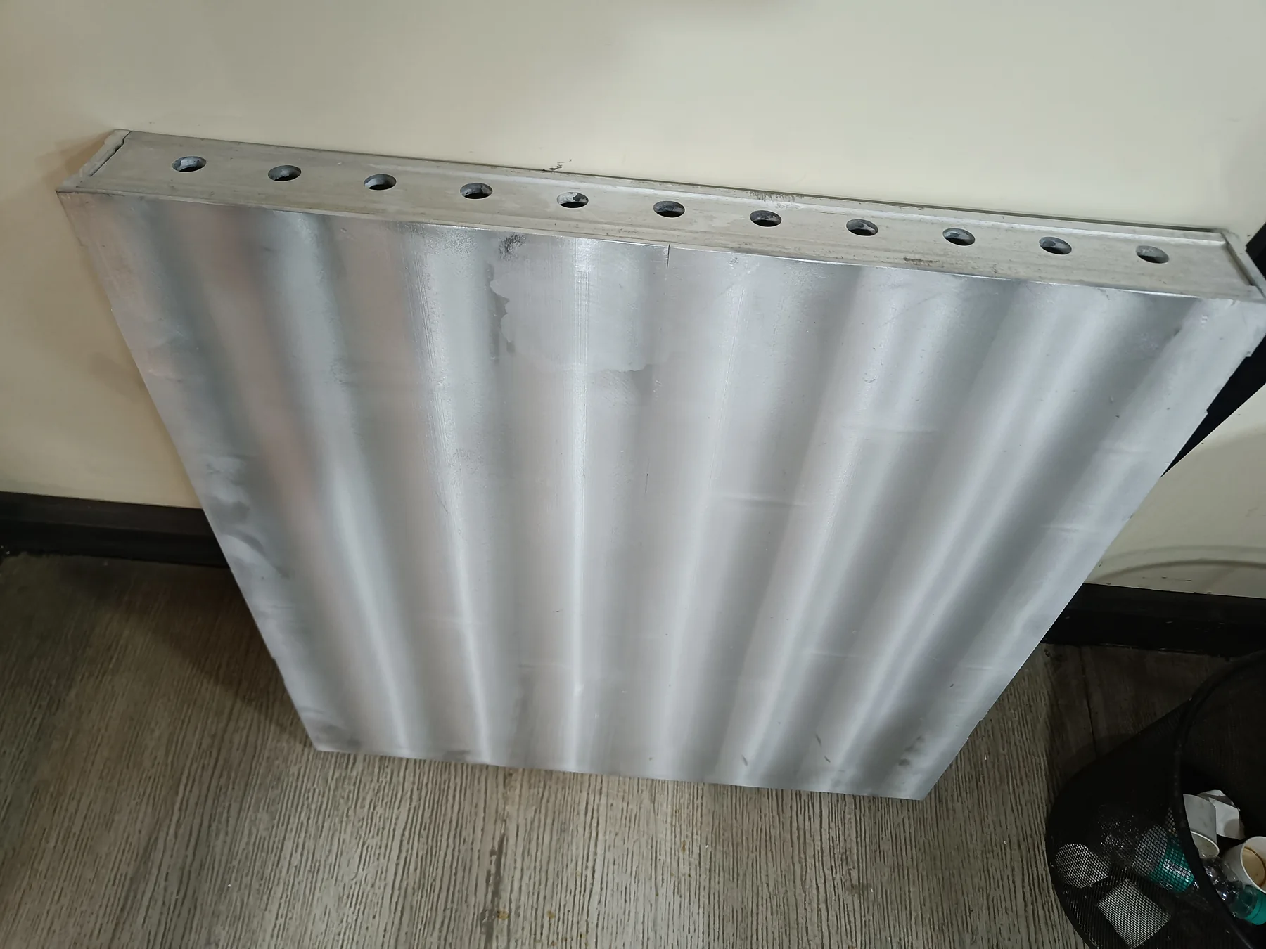 Buffed aluminium formwork panel finish prepared for renewed service